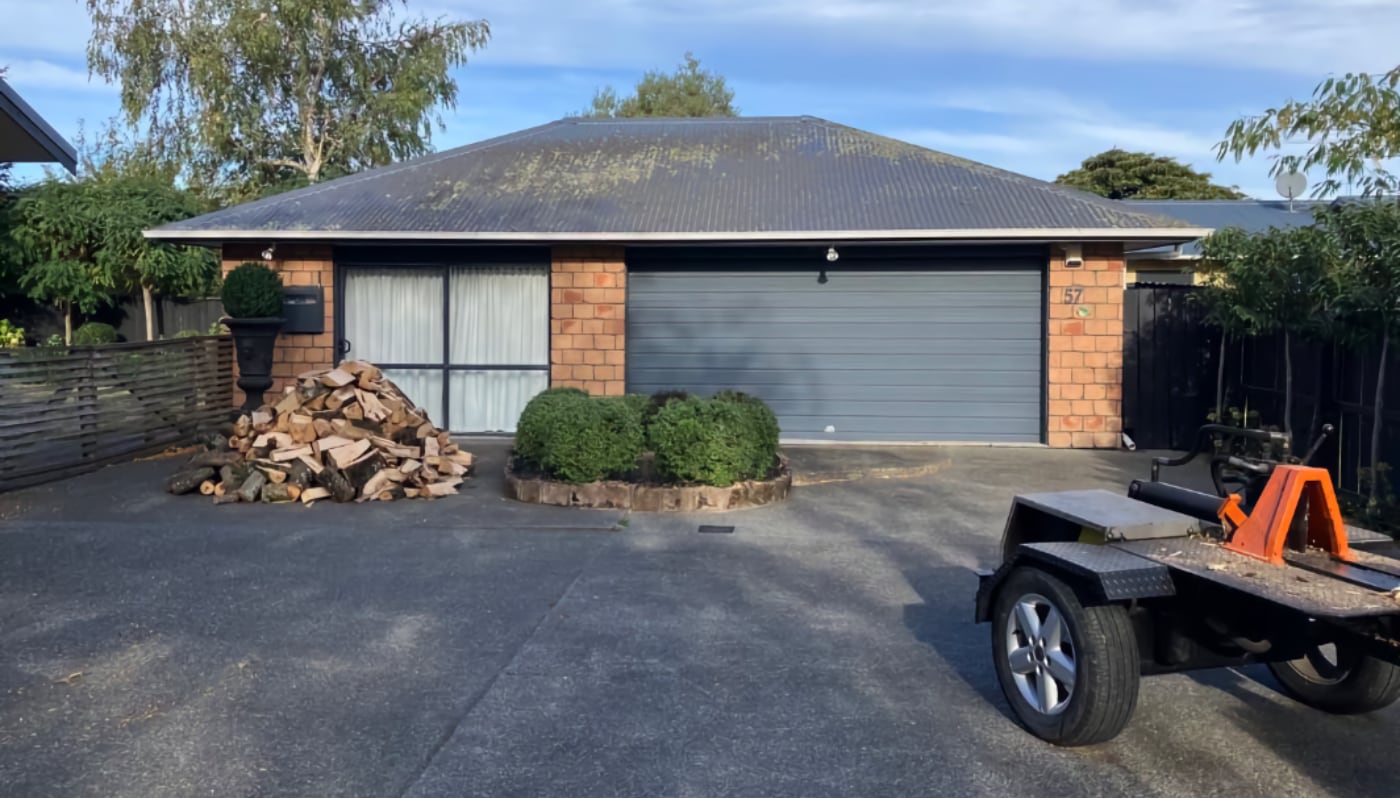 Setting up a tree for removal using winches to direct the tree away from property